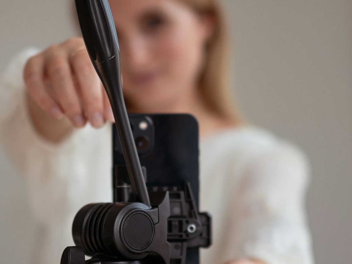 Filming with a phone mounted on a tripod